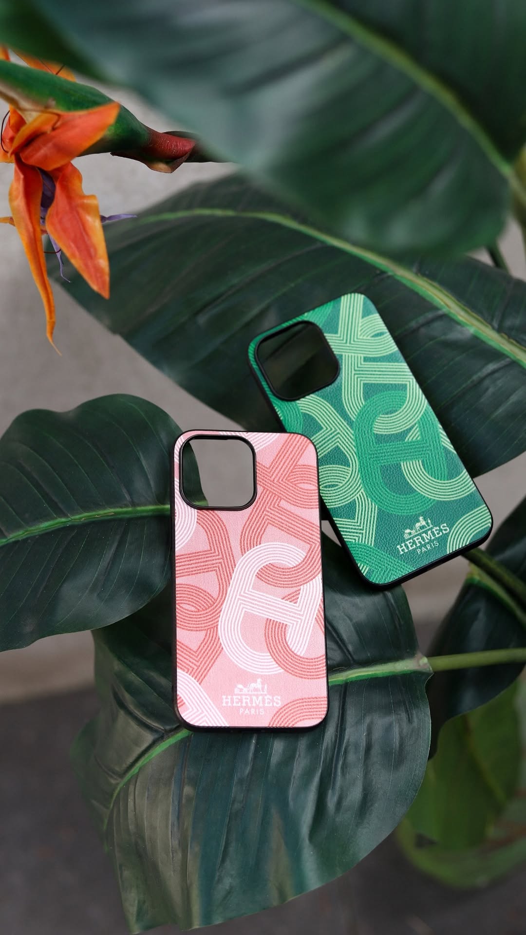 Hermes iPhone 16 Pro Max case with repeating H-pattern in pink, with a black border.