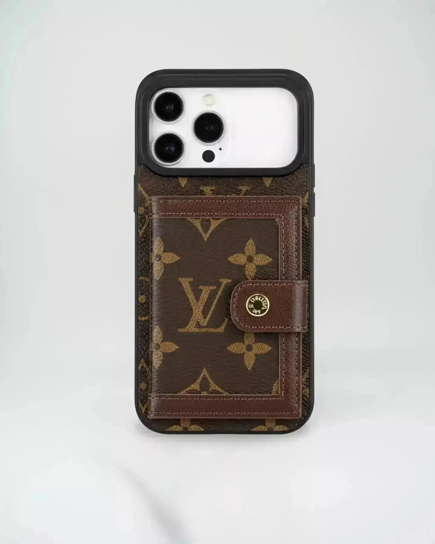 Louis Vuitton iPhone 17 Pro Max Case in the classic Monogram Canvas (deep brown with LV and floral accents) SereneShop
