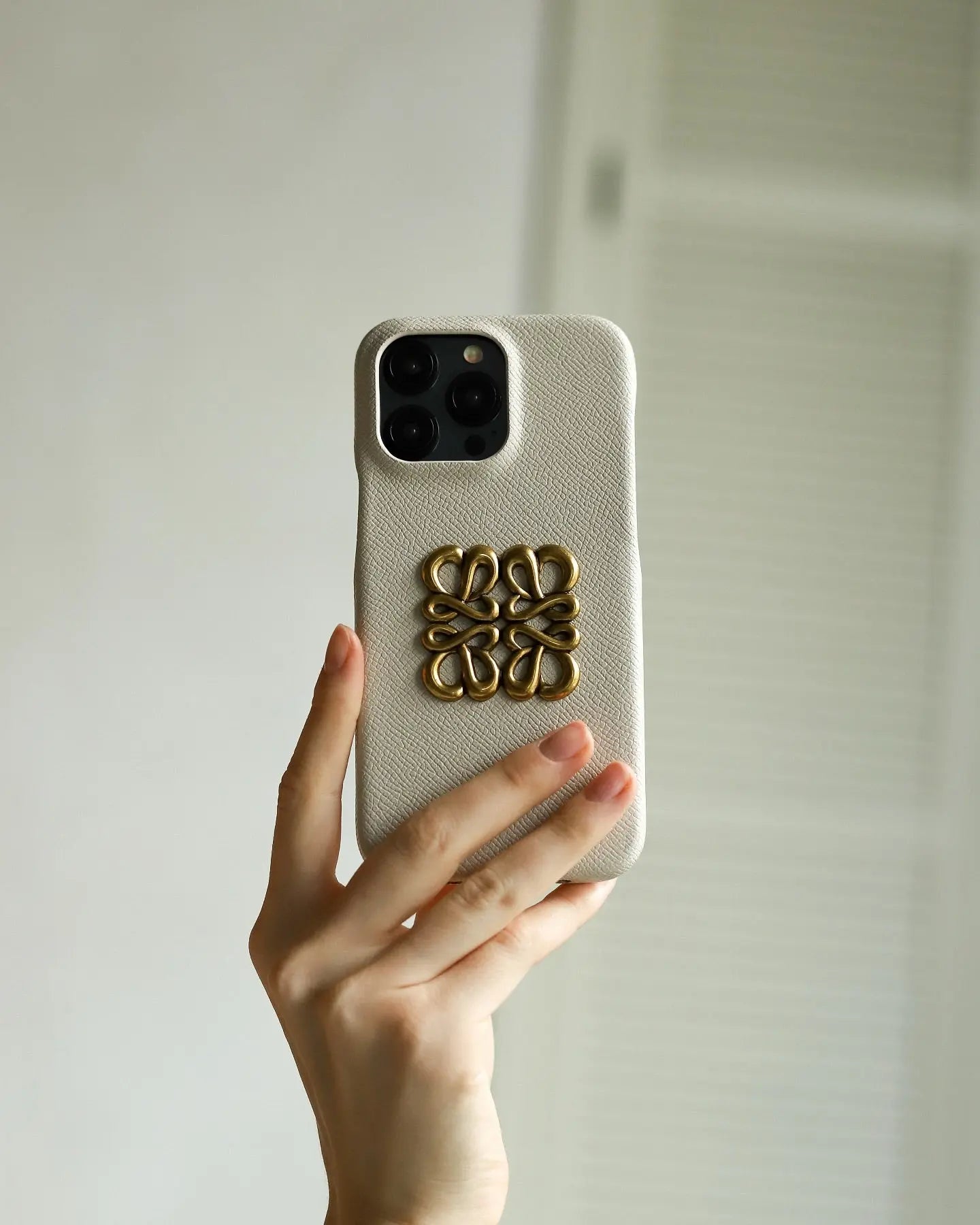 Ivory Pearl Loewe iPhone 16 Pro Max Case - SereneShop 